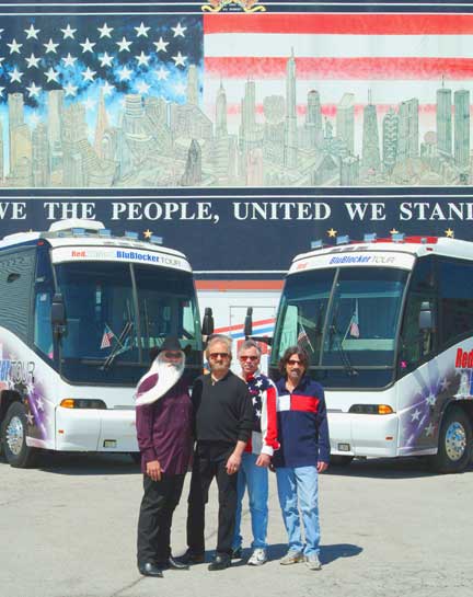 Oak Ridge Boys standing in front of tour buses